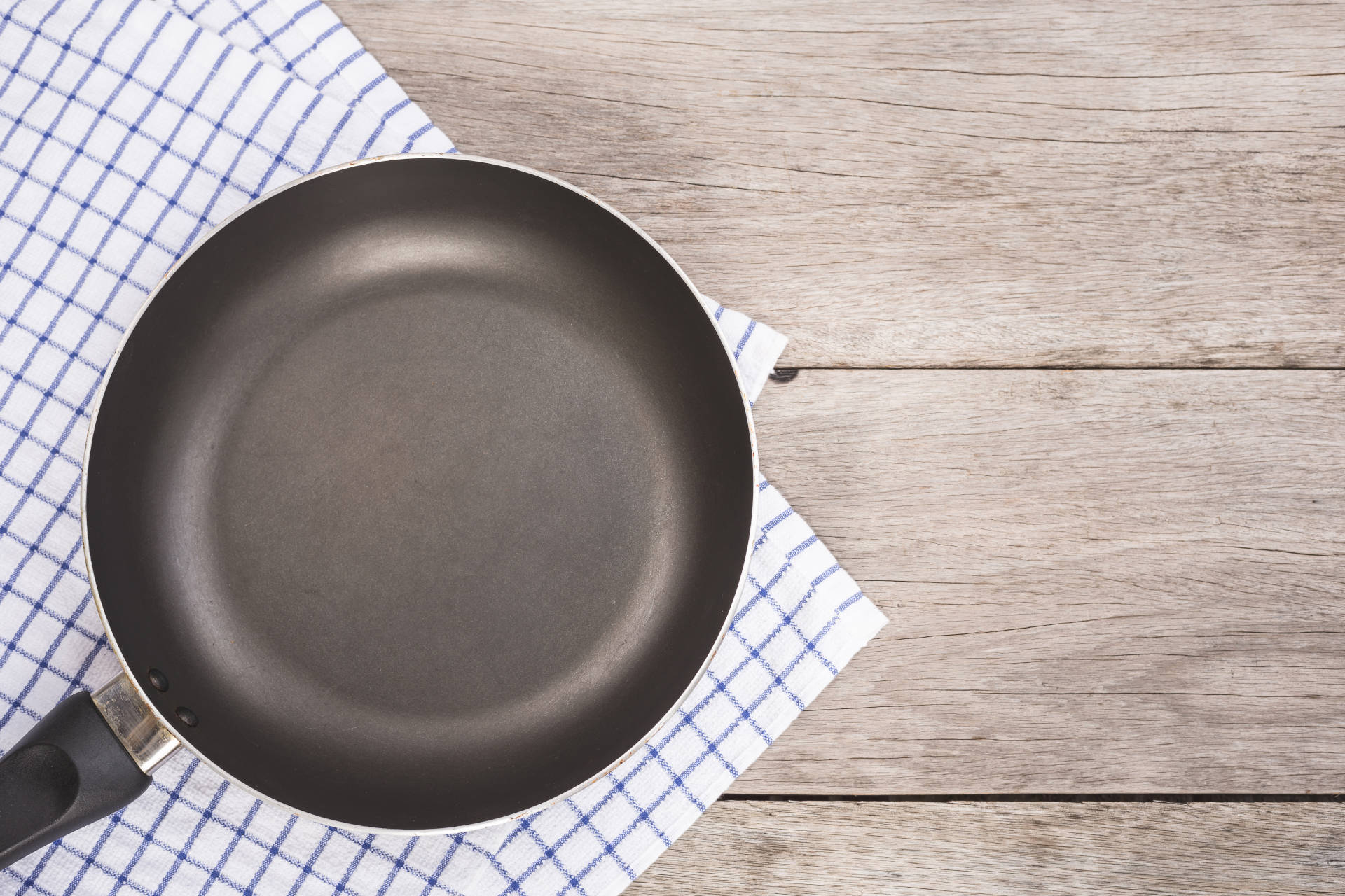 Stainless steel non-stick pan on countertop